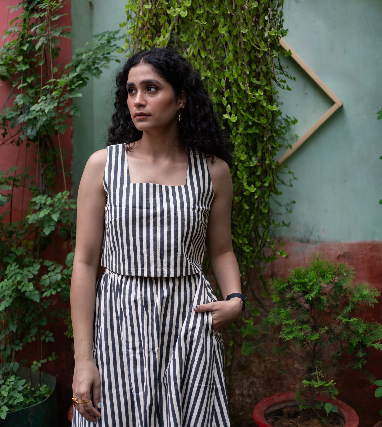 Stripes Yoko Skirt in Black ? a paneled, long sustainable cotton skirt with an elastic waistband and pockets. Made from organic, hand-loomed 'kala' cotton in India.