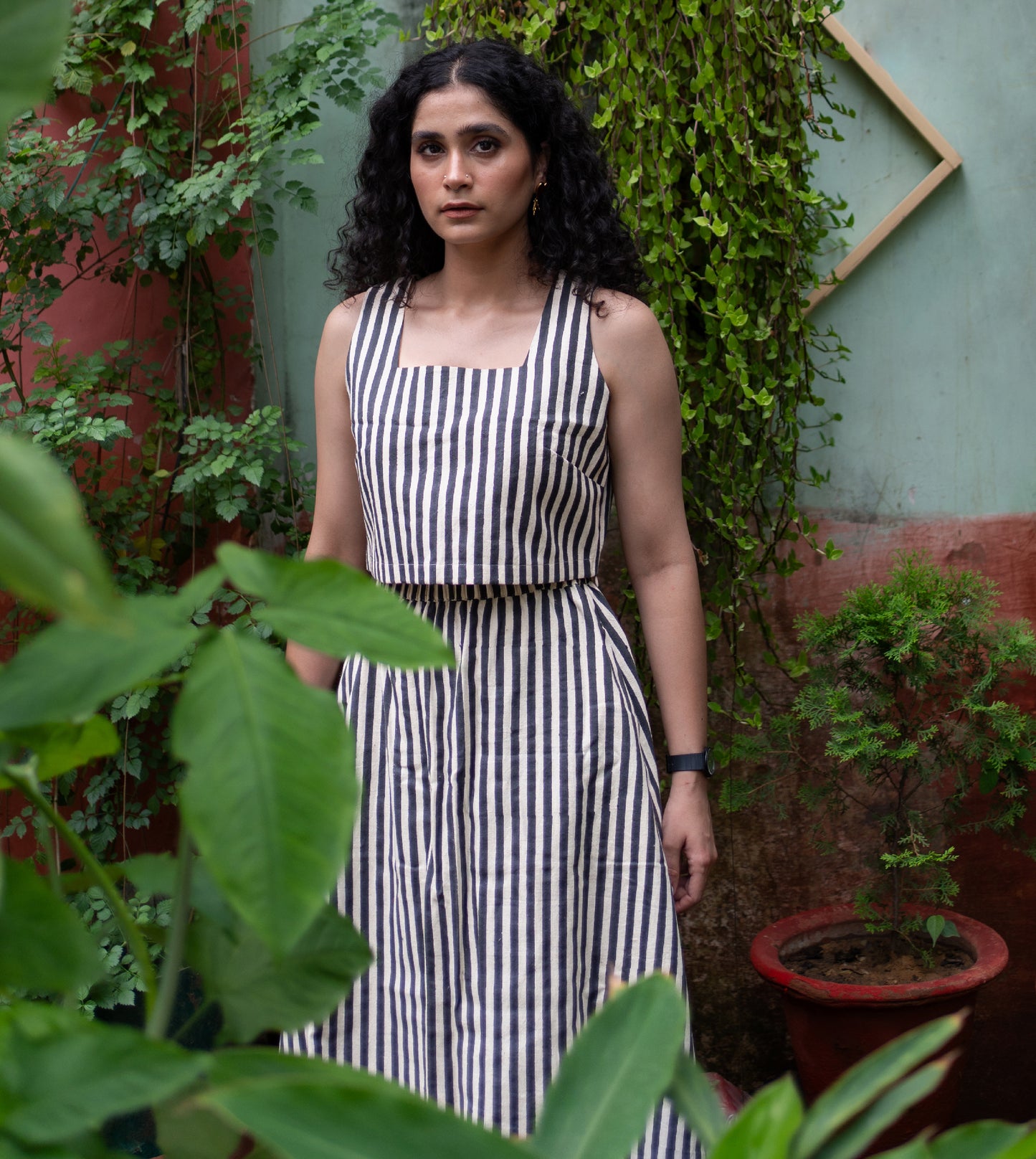 Stripes Yoko Skirt in Black ? a paneled, long sustainable cotton skirt with an elastic waistband and pockets. Made from organic, hand-loomed 'kala' cotton in India.