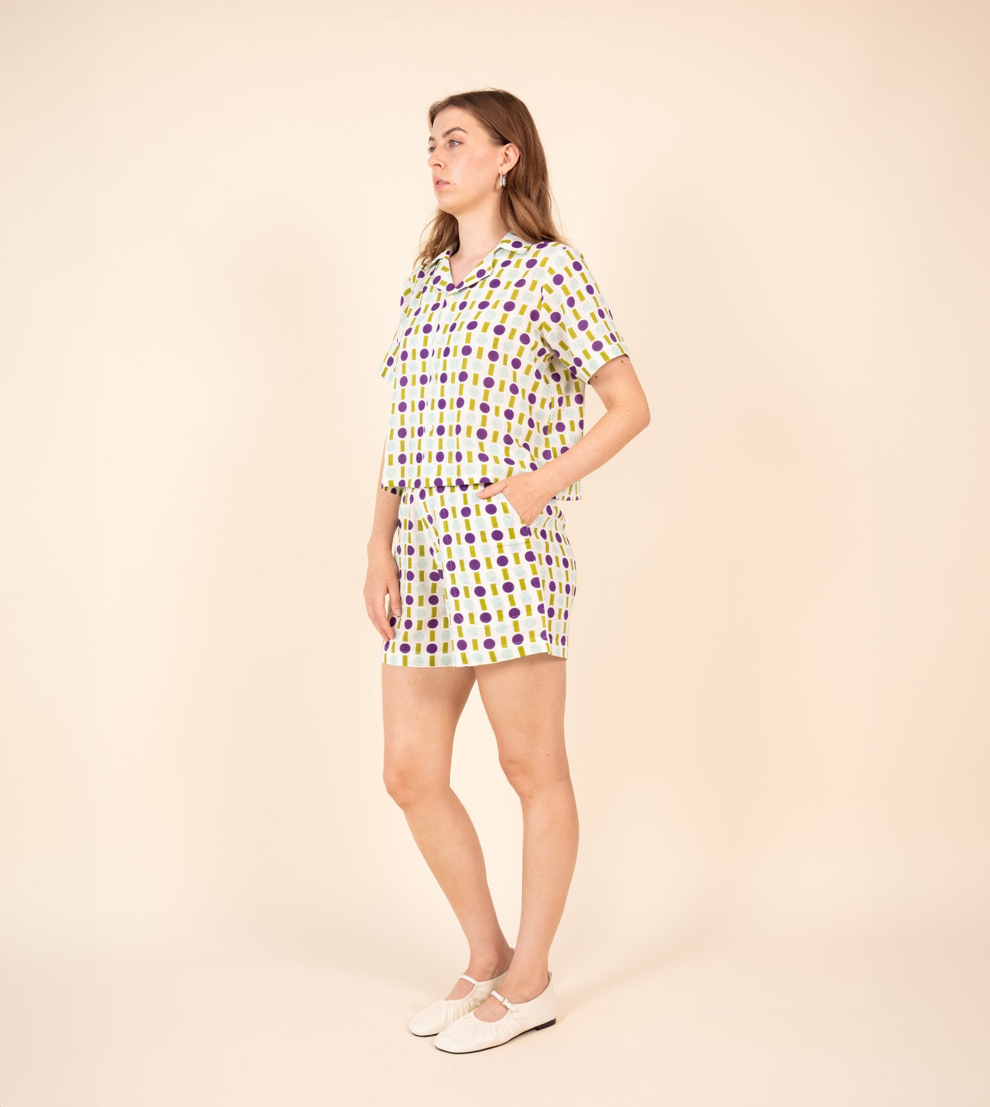 Ren Shorts Green Purple | Harkoi Studio - Make a bold statement with the Ren Shorts in green & purple. Keywords: sustainable shorts, eco-friendly fashion, Ren Shorts, green & purple shorts, ethical clothing.