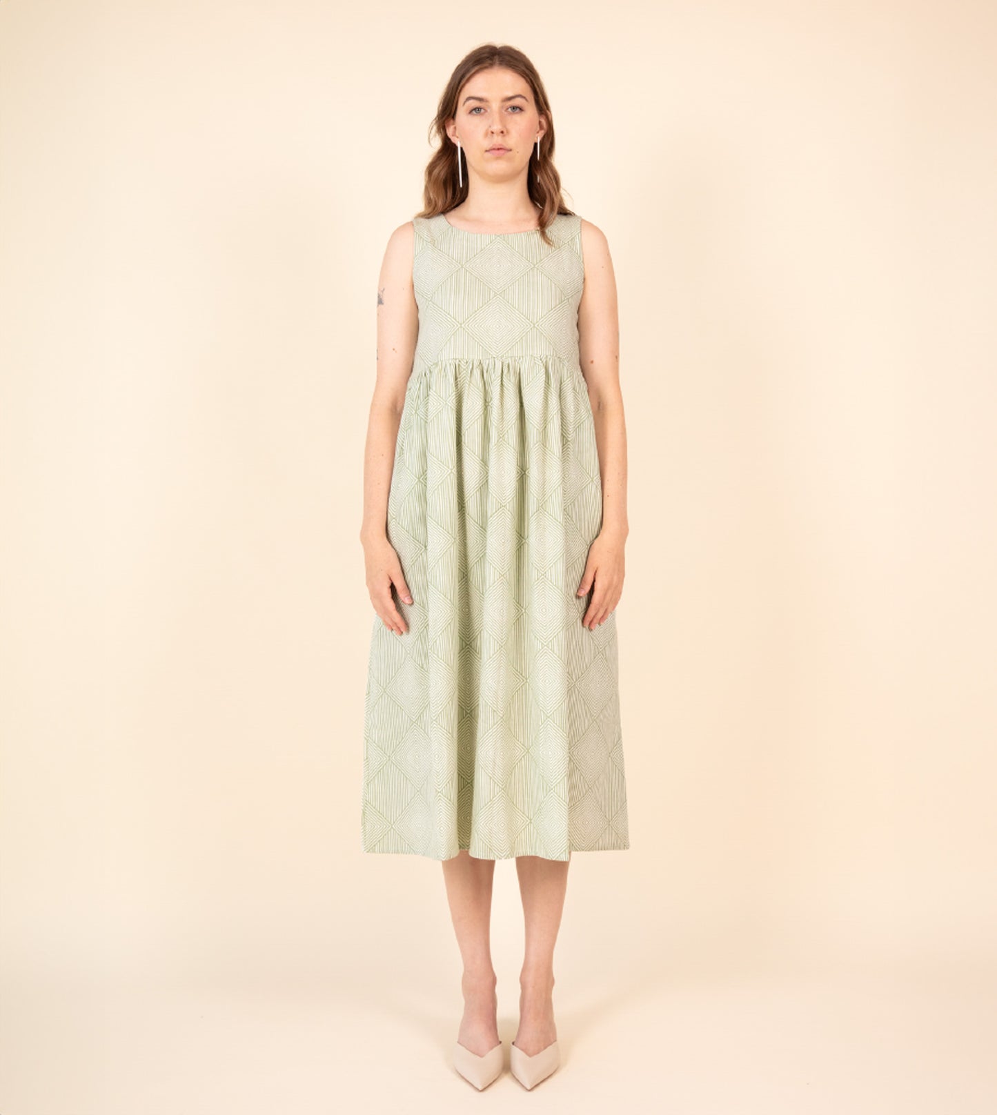 Suki Dress Green | Harkoi Studio - Your ideal companion for both casual and formal settings, the Suki Dress, a sustainable- crafted with precision and care. Keywords: suki, dress, green, sustainable green, eco-friendly fashion.