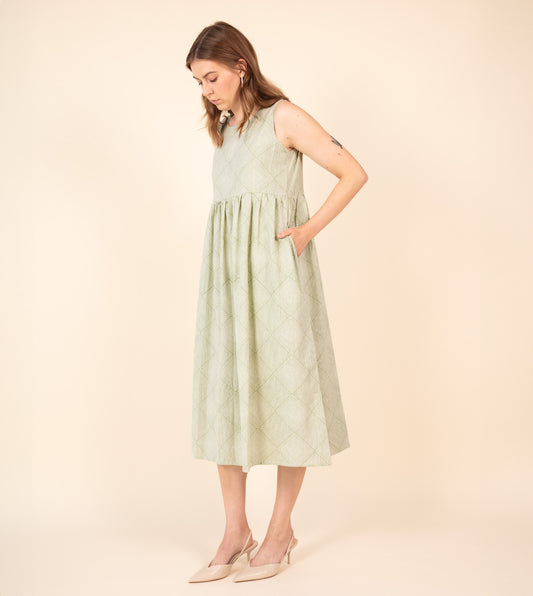 Suki Dress Green | Harkoi Studio - Your ideal companion for both casual and formal settings, the Suki Dress, a sustainable- crafted with precision and care. Keywords: suki, dress, green, sustainable green, eco-friendly fashion.