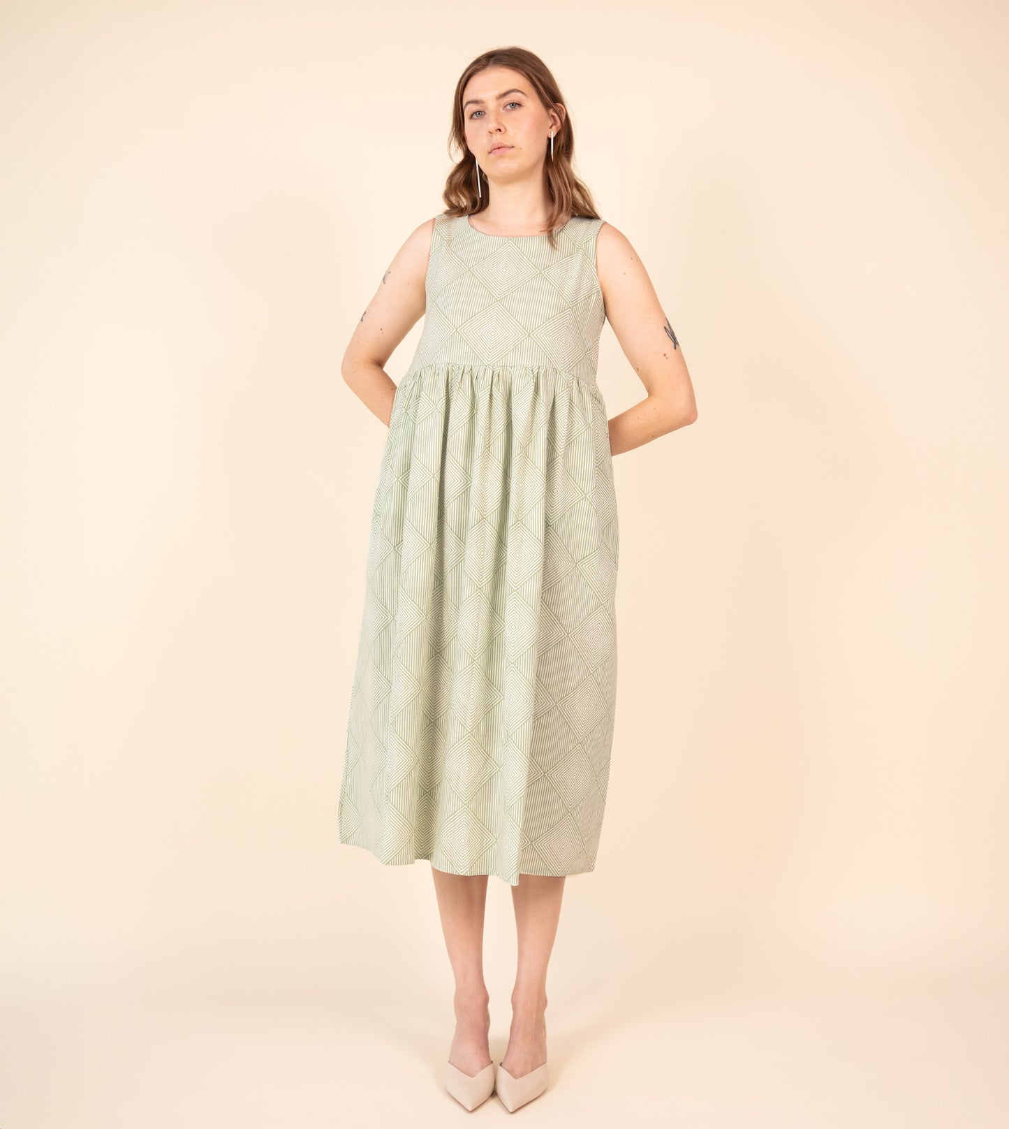 Suki Dress Green | Harkoi Studio - Your ideal companion for both casual and formal settings, the Suki Dress, a sustainable- crafted with precision and care. Keywords: suki, dress, green, sustainable green, eco-friendly fashion.