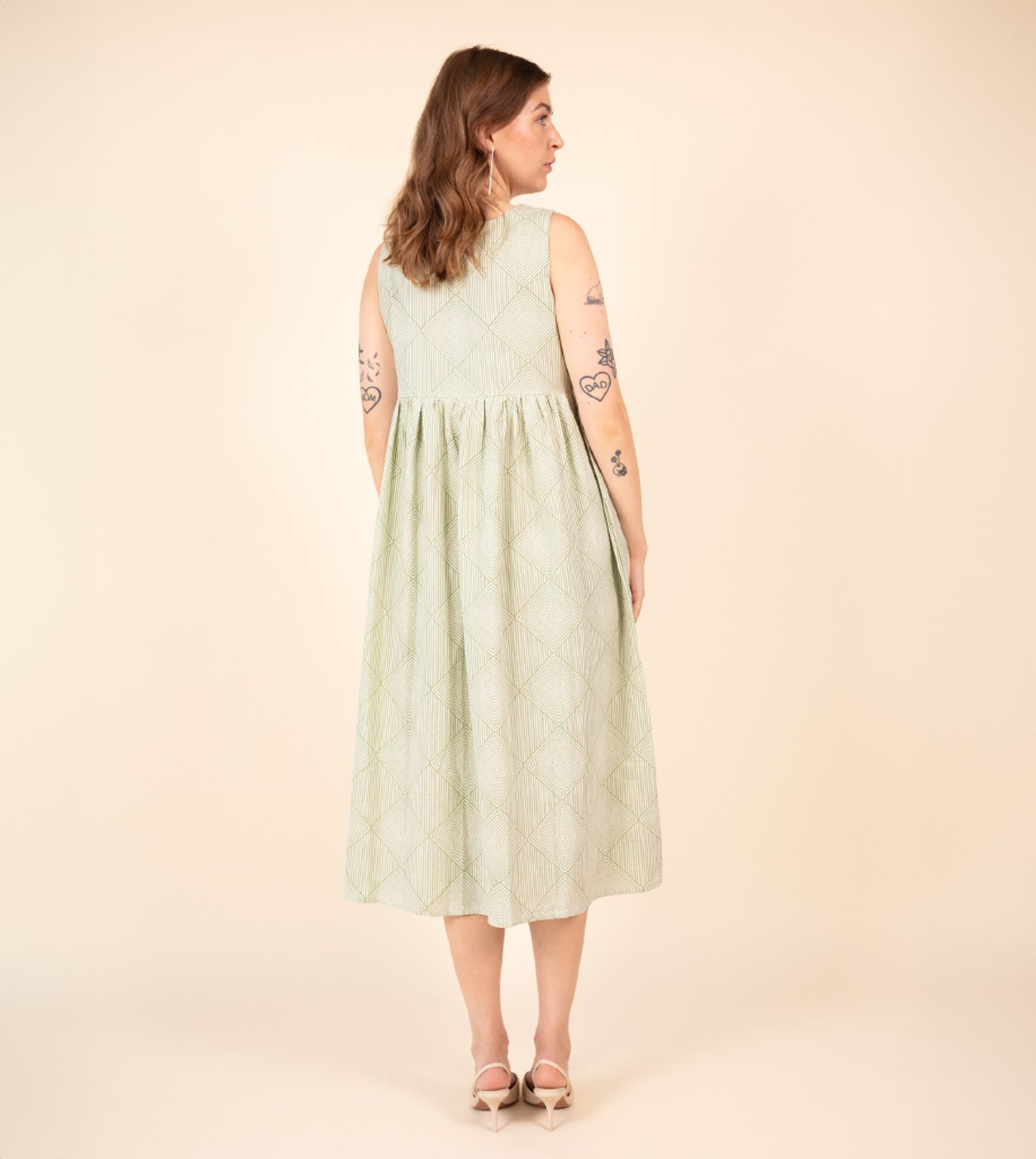 Suki Dress Green | Harkoi Studio - Your ideal companion for both casual and formal settings, the Suki Dress, a sustainable- crafted with precision and care. Keywords: suki, dress, green, sustainable green, eco-friendly fashion.