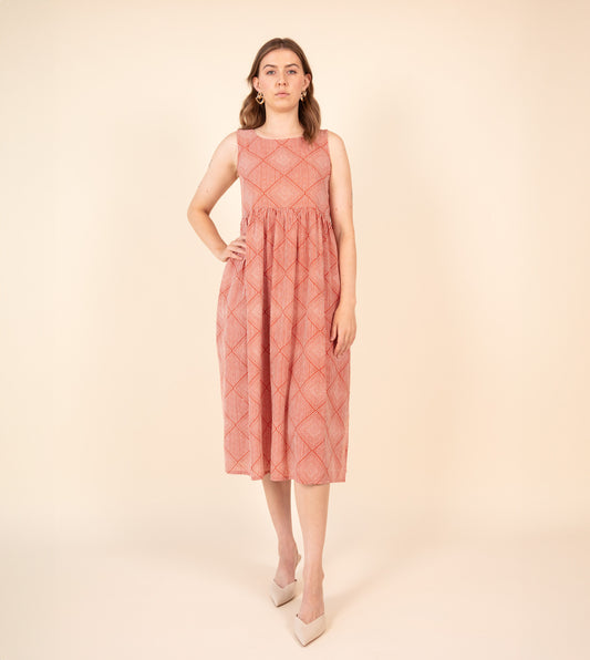 Suki Dress Orange | Harkoi Studio - Brighten your wardrobe with the Suki Dress in vibrant orange. Keywords: sustainable dress, eco-friendly fashion, Suki Dress, orange dress, ethical clothing.