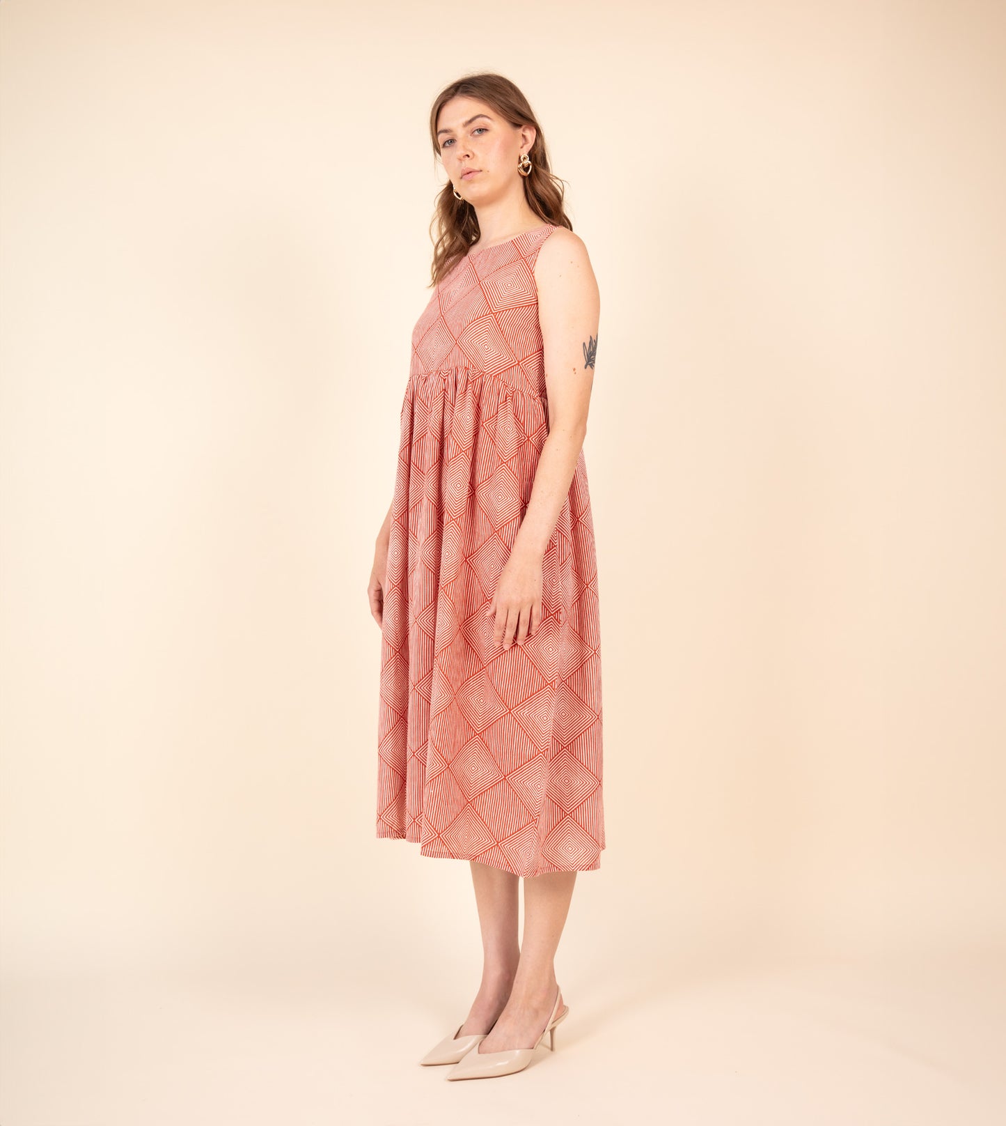 Suki Dress Orange | Harkoi Studio - Brighten your wardrobe with the Suki Dress in vibrant orange. Keywords: sustainable dress, eco-friendly fashion, Suki Dress, orange dress, ethical clothing.