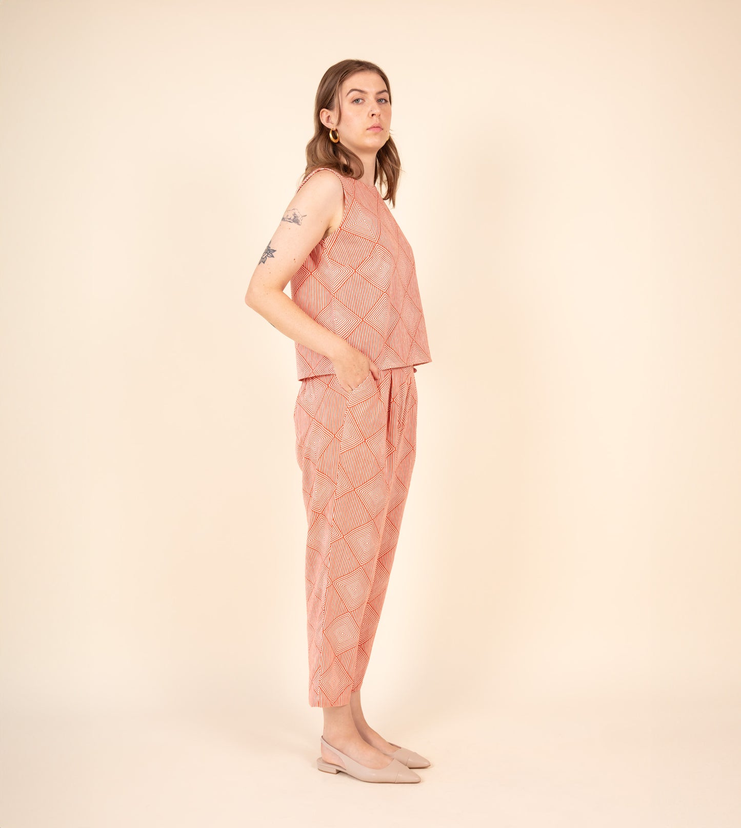 Haru Pants Orange - Harkoi Studio - Brighten your wardrobe with the Haru Pants in bold orange. Keywords: sustainable pants, eco-friendly fashion, comfortable trousers, casual wear