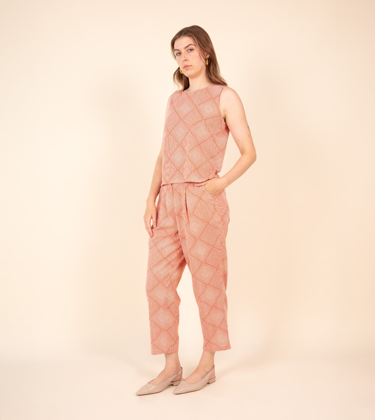 Haru Pants Orange - Harkoi Studio - Brighten your wardrobe with the Haru Pants in bold orange. Keywords: sustainable pants, eco-friendly fashion, comfortable trousers, casual wear