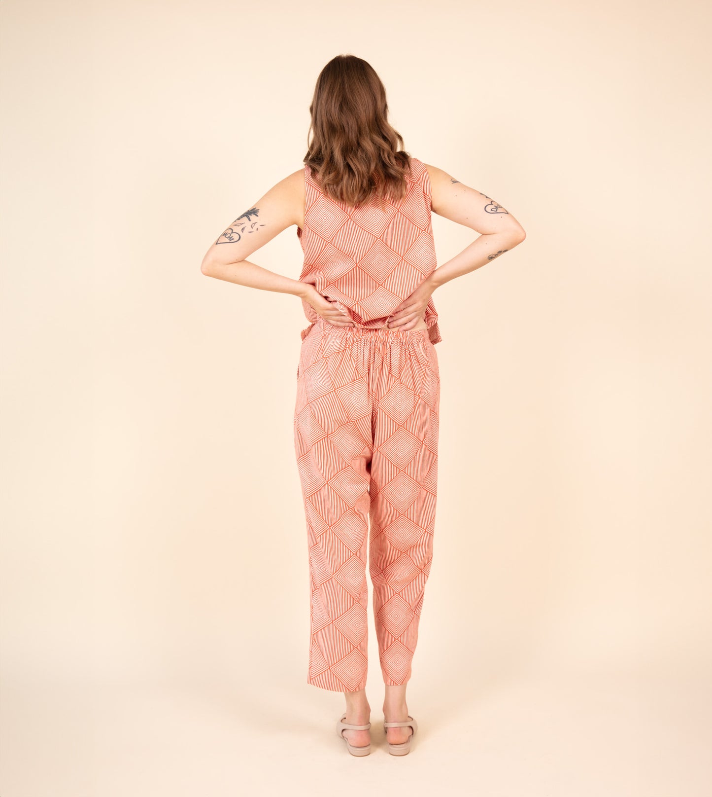 Haru Pants Orange - Harkoi Studio - Brighten your wardrobe with the Haru Pants in bold orange. Keywords: sustainable pants, eco-friendly fashion, comfortable trousers, casual wear