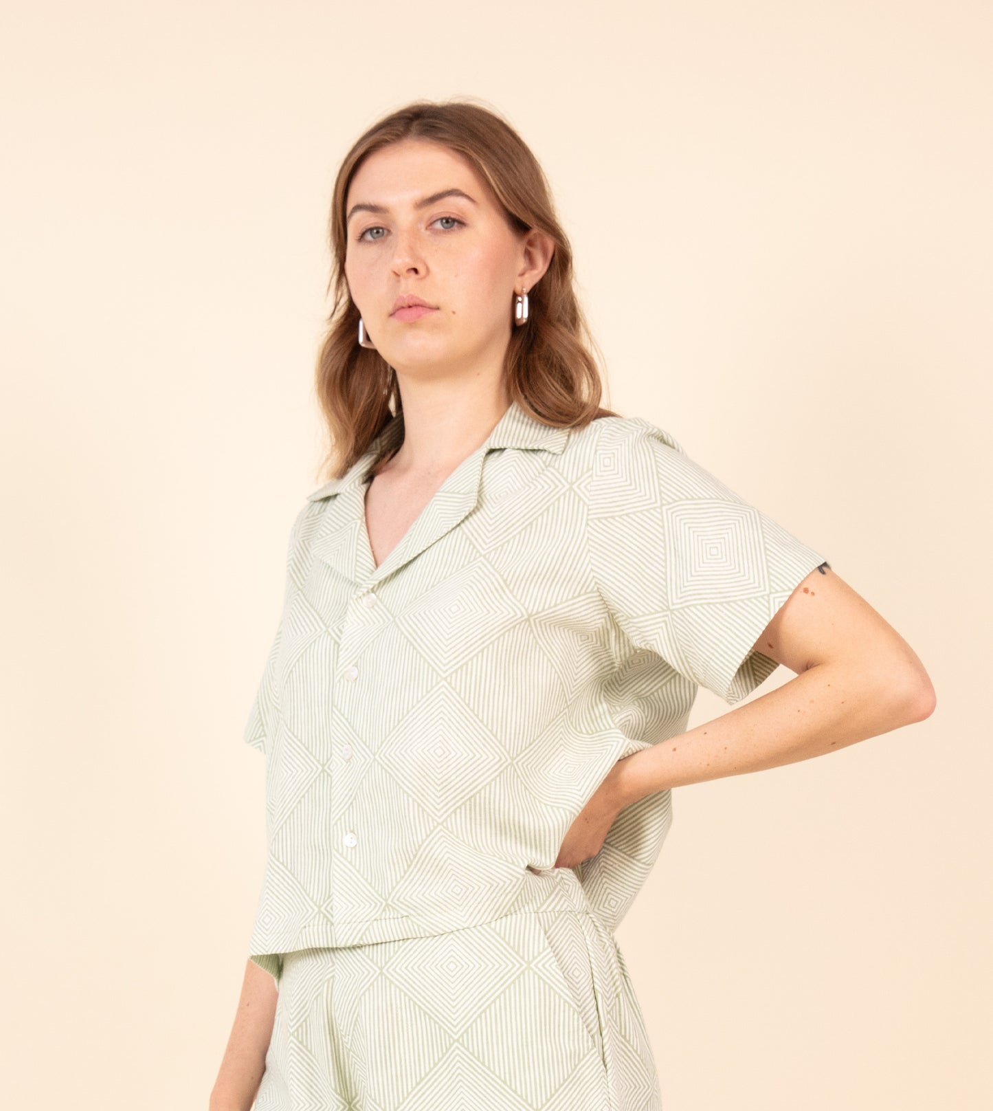 Radiate Rin Top Pale Green | Harkoi Studio - Embrace effortless elegance with the Radiate Rin Top in pale green. Keywords: sustainable top, eco-friendly fashion, Radiate Rin Top, pale green blouse, ethical clothing.