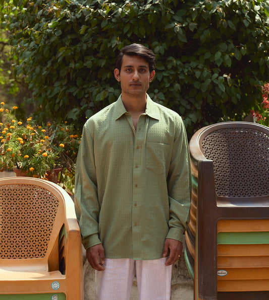 "Men’s full-sleeve khadi cotton shirt with ditsy check pattern and brass buttons, versatile design.
