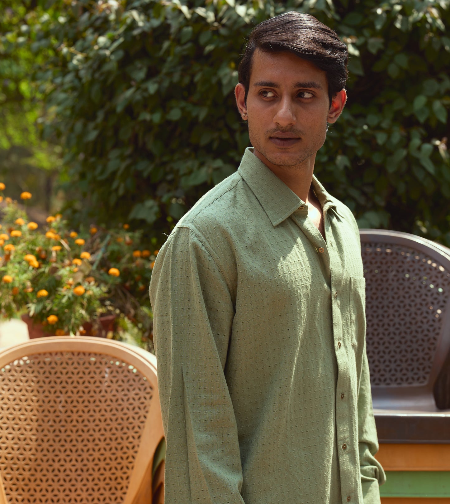"Men’s full-sleeve khadi cotton shirt with ditsy check pattern and brass buttons, versatile design.