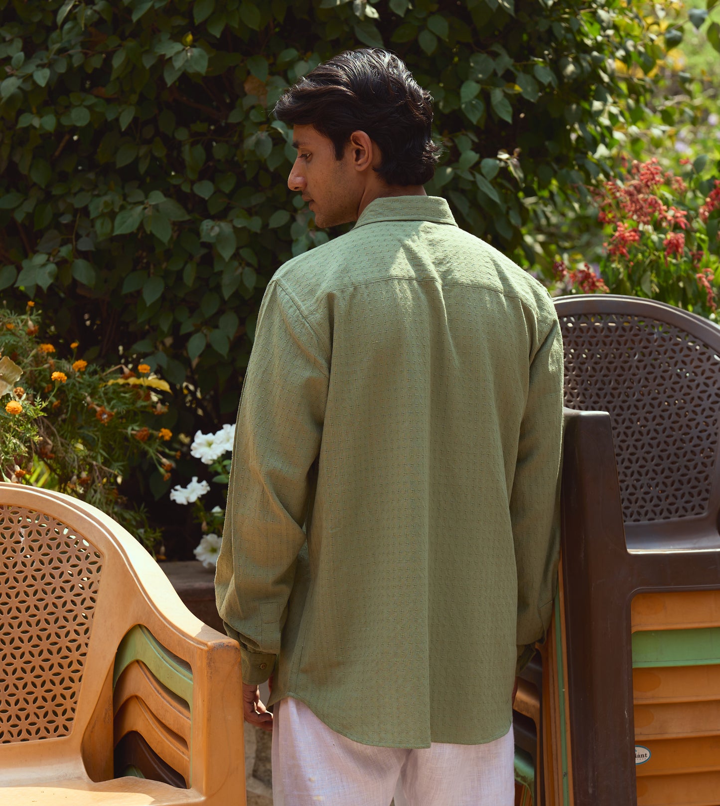 "Men’s full-sleeve khadi cotton shirt with ditsy check pattern and brass buttons, versatile design.