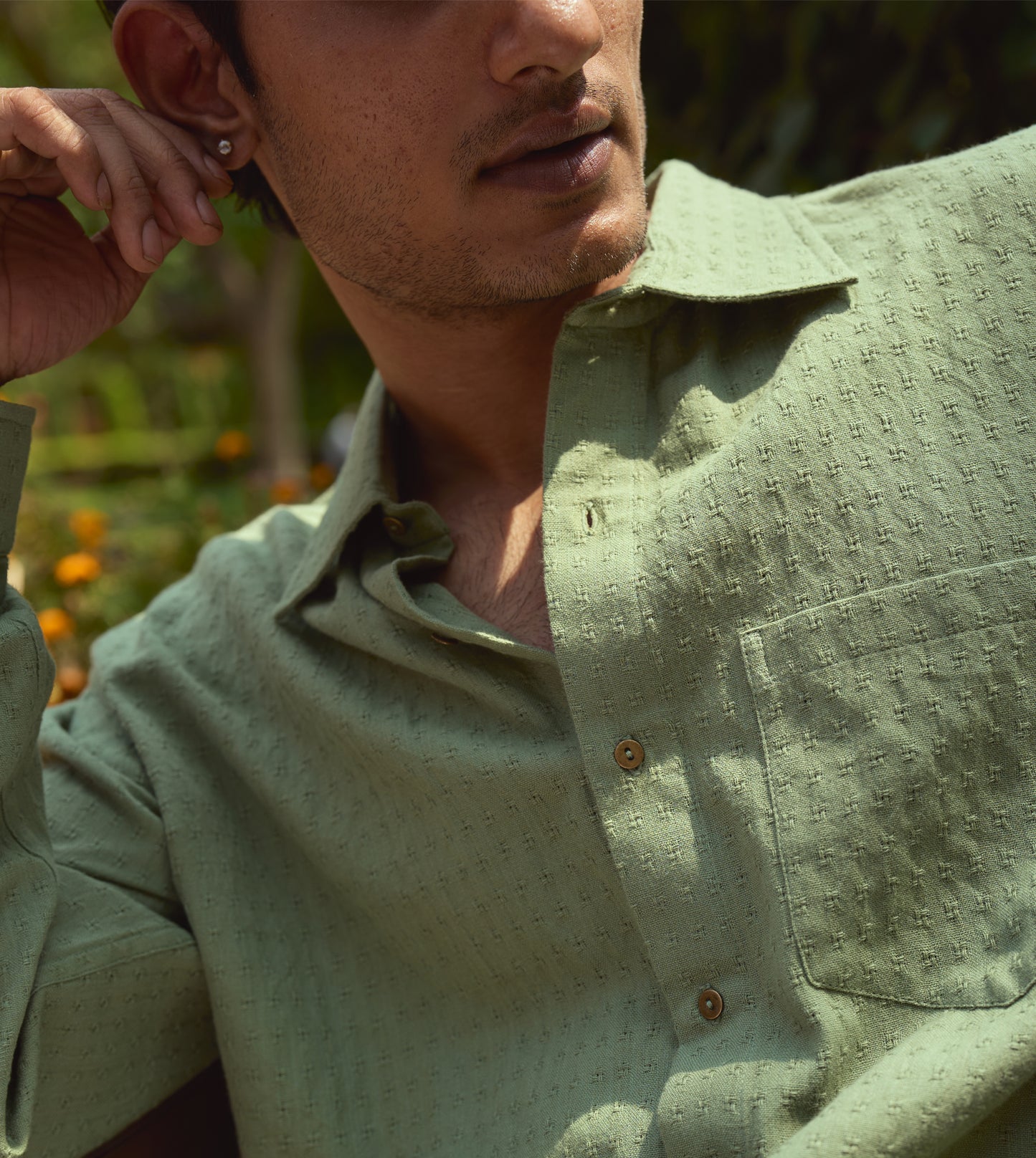 "Men’s full-sleeve khadi cotton shirt with ditsy check pattern and brass buttons, versatile design.