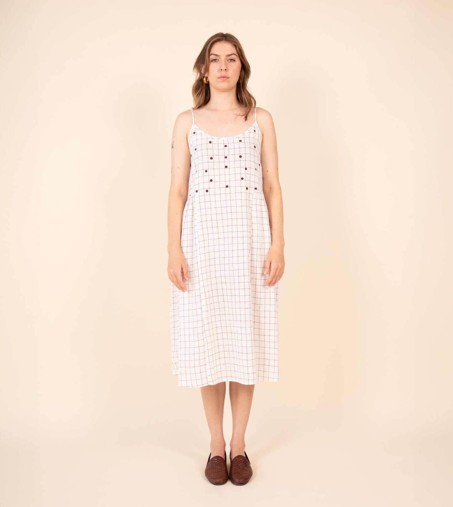 Neusa Dress Woven Check Embroidered - Harkoi Studio - Discover the Neusa Dress in woven check with delicate embroidery. Keywords: sustainable dress, eco-friendly clothing, Neusa Dress, woven check dress, embroidered dress, ethical fashion.