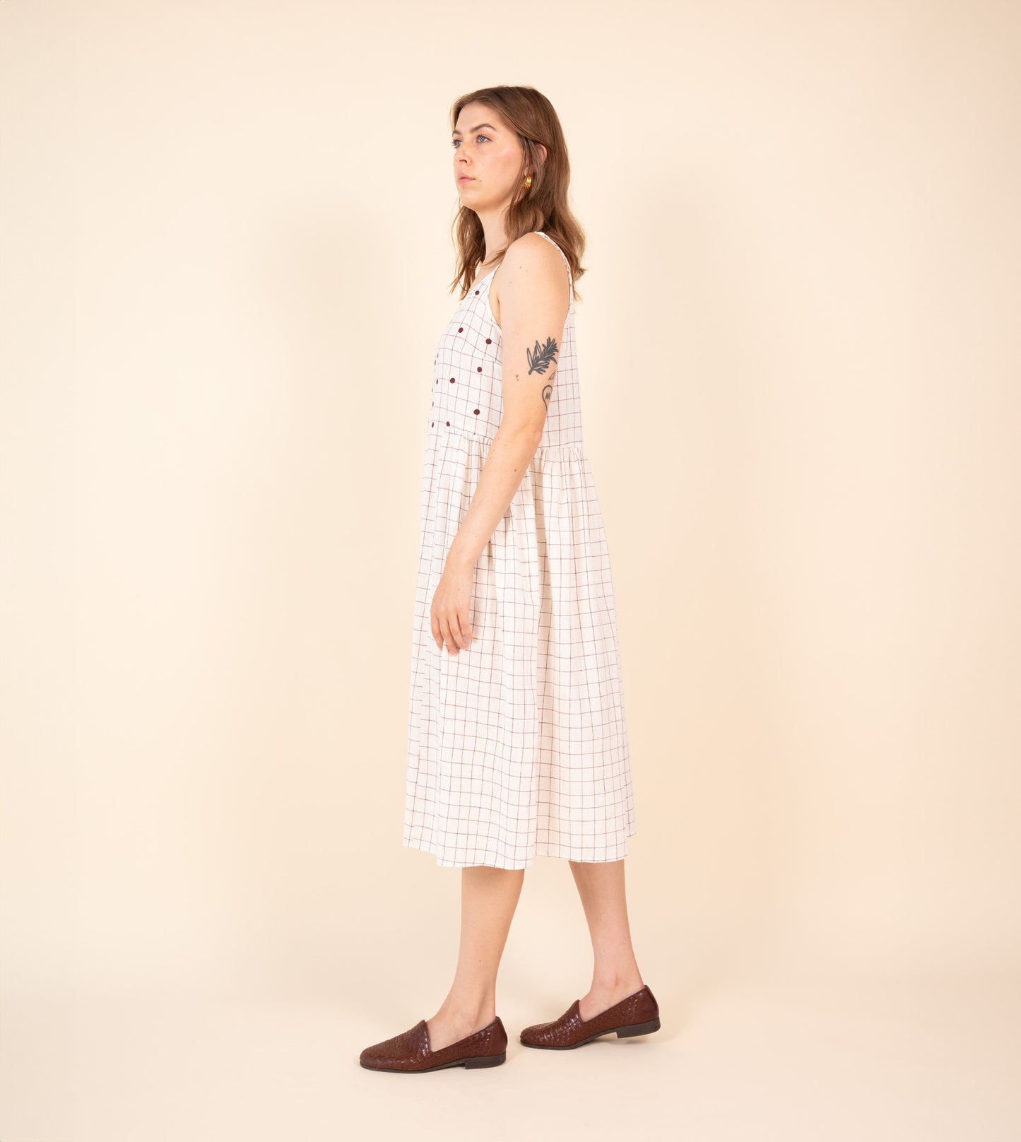 Neusa Dress Woven Check Embroidered - Harkoi Studio - Discover the Neusa Dress in woven check with delicate embroidery. Keywords: sustainable dress, eco-friendly clothing, Neusa Dress, woven check dress, embroidered dress, ethical fashion.