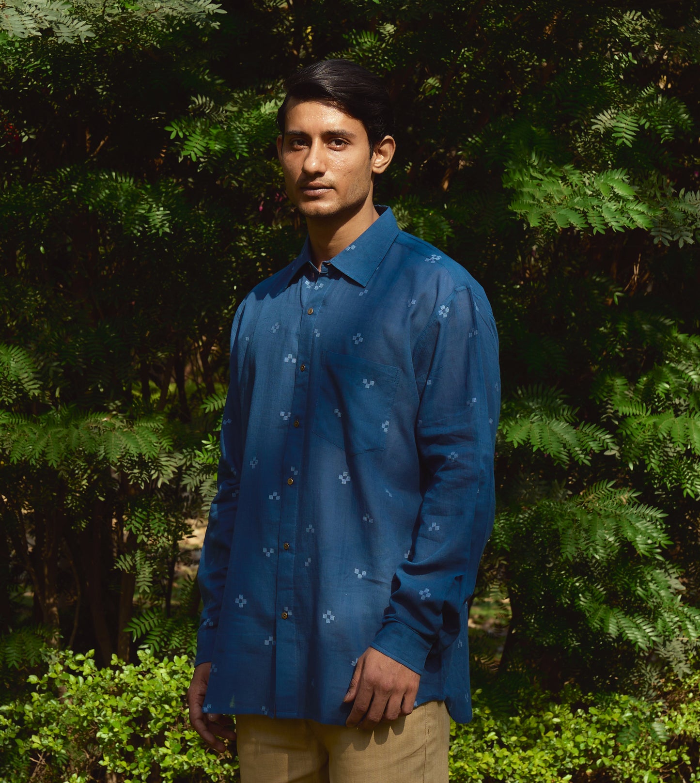 Men’s full-sleeve jamdani cotton shirt with tetris weave pattern and corozo buttons, handcrafted style.