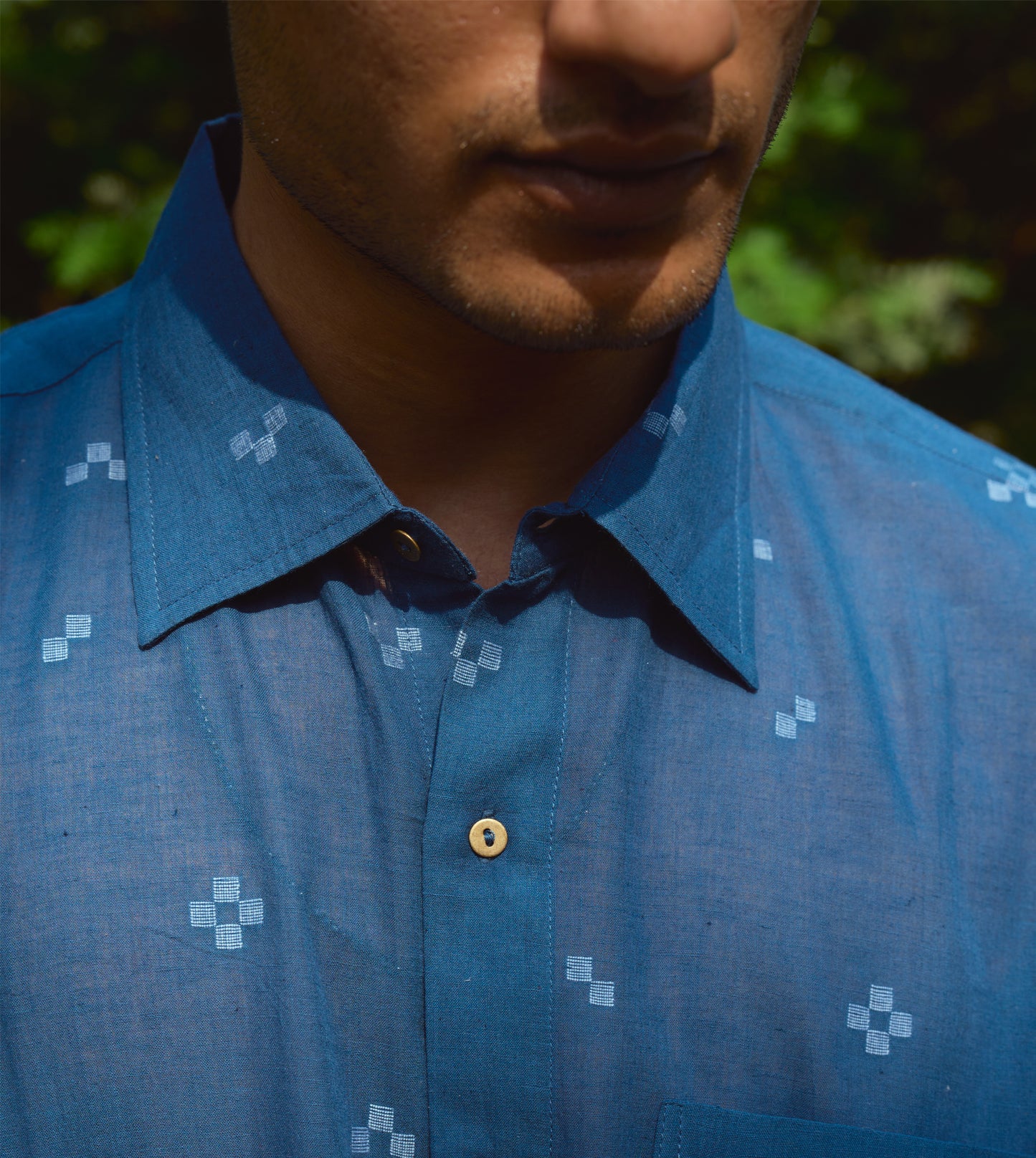 Men’s full-sleeve jamdani cotton shirt with tetris weave pattern and corozo buttons, handcrafted style.