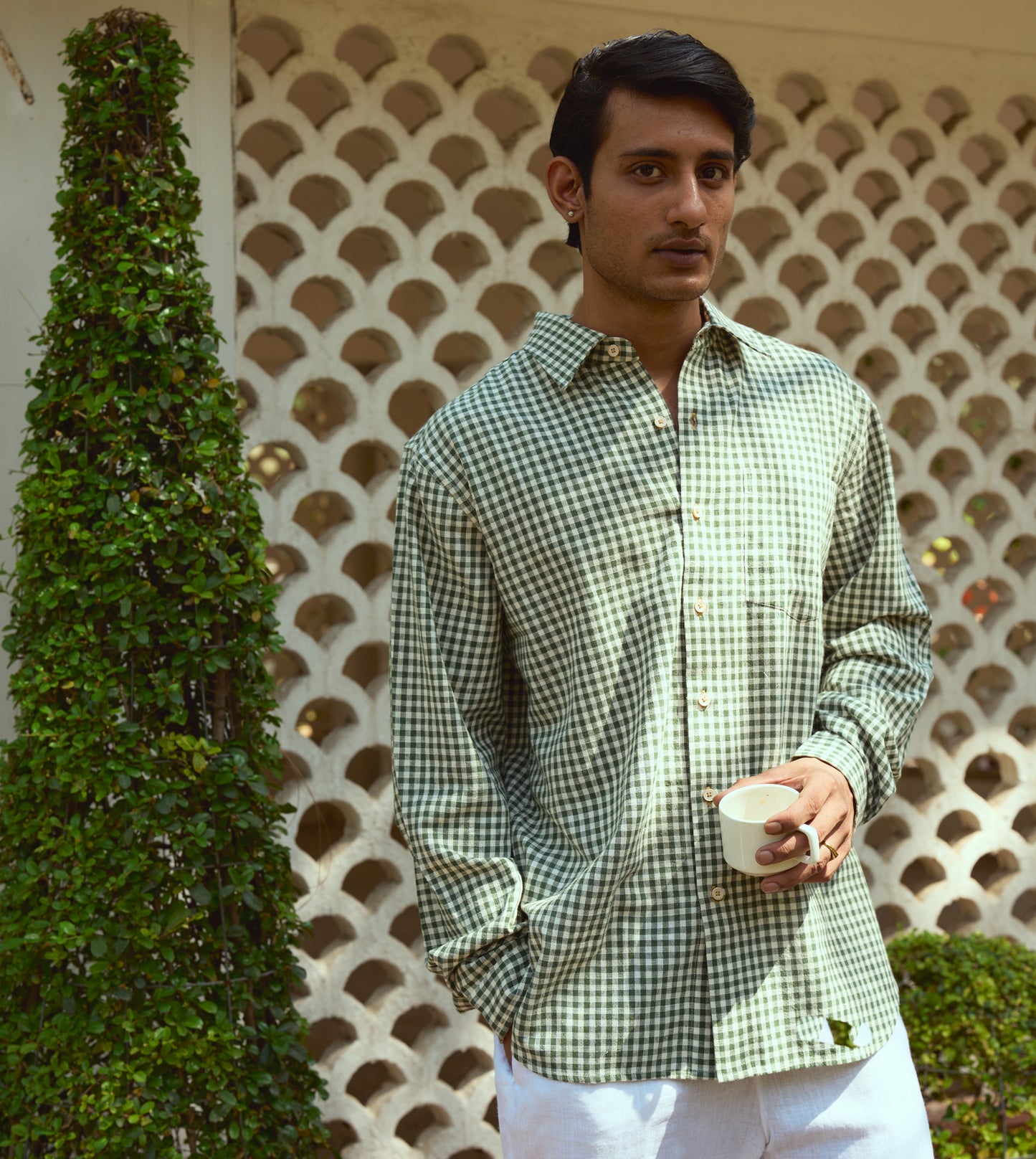 Men’s full-sleeve gingham kala cotton shirt with corozo buttons, designed for versatile styling.