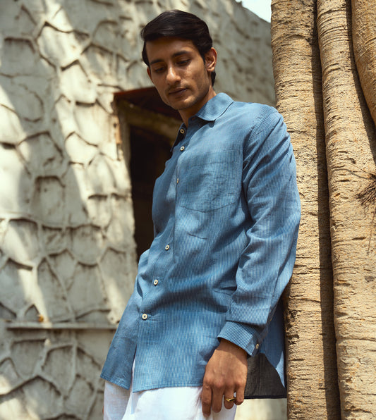 Men’s pinstriped khadi cotton full-sleeve shirt with corozo buttons, suitable for casual or formal looks.