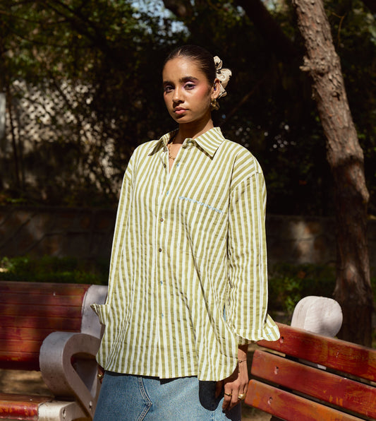 Block-printed striped kala cotton shirt with brass buttons, blue embroidery, and a relaxed fit.