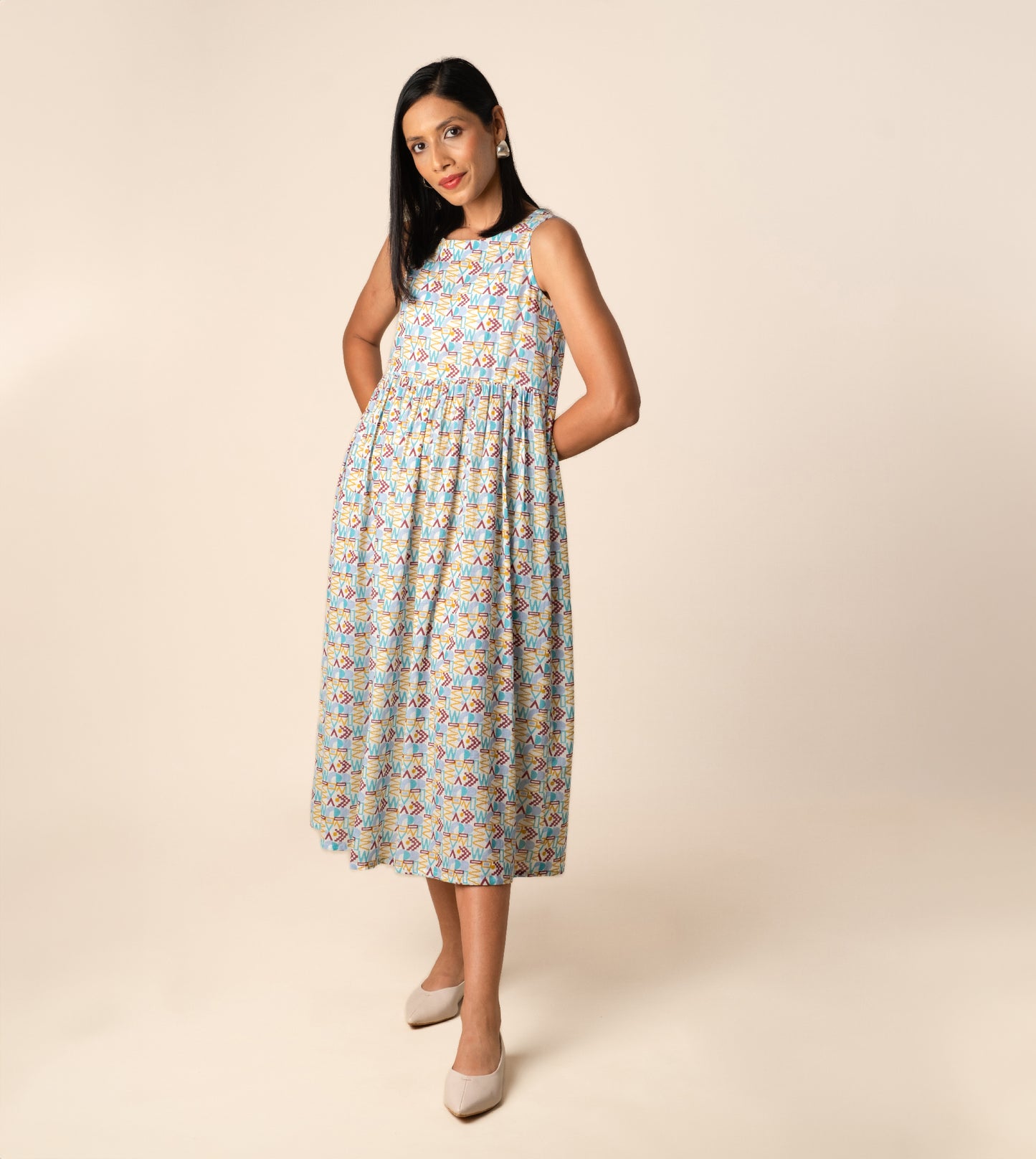 Suki Dress Girard | Harkoi Studio - Turn heads with the Suki Dress in the bold Girard pattern. Keywords: sustainable dress, eco-friendly fashion, Suki Dress, Girard-patterned dress, ethical clothing.