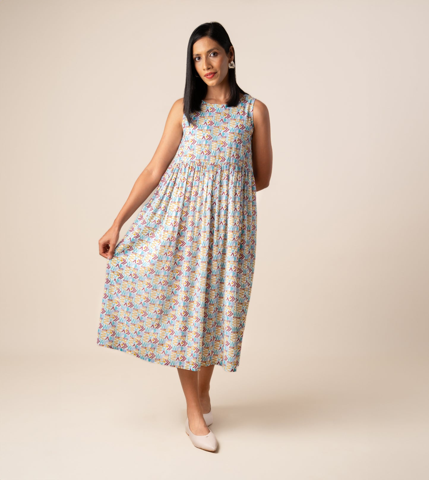 Suki Dress Girard | Harkoi Studio - Turn heads with the Suki Dress in the bold Girard pattern. Keywords: sustainable dress, eco-friendly fashion, Suki Dress, Girard-patterned dress, ethical clothing.