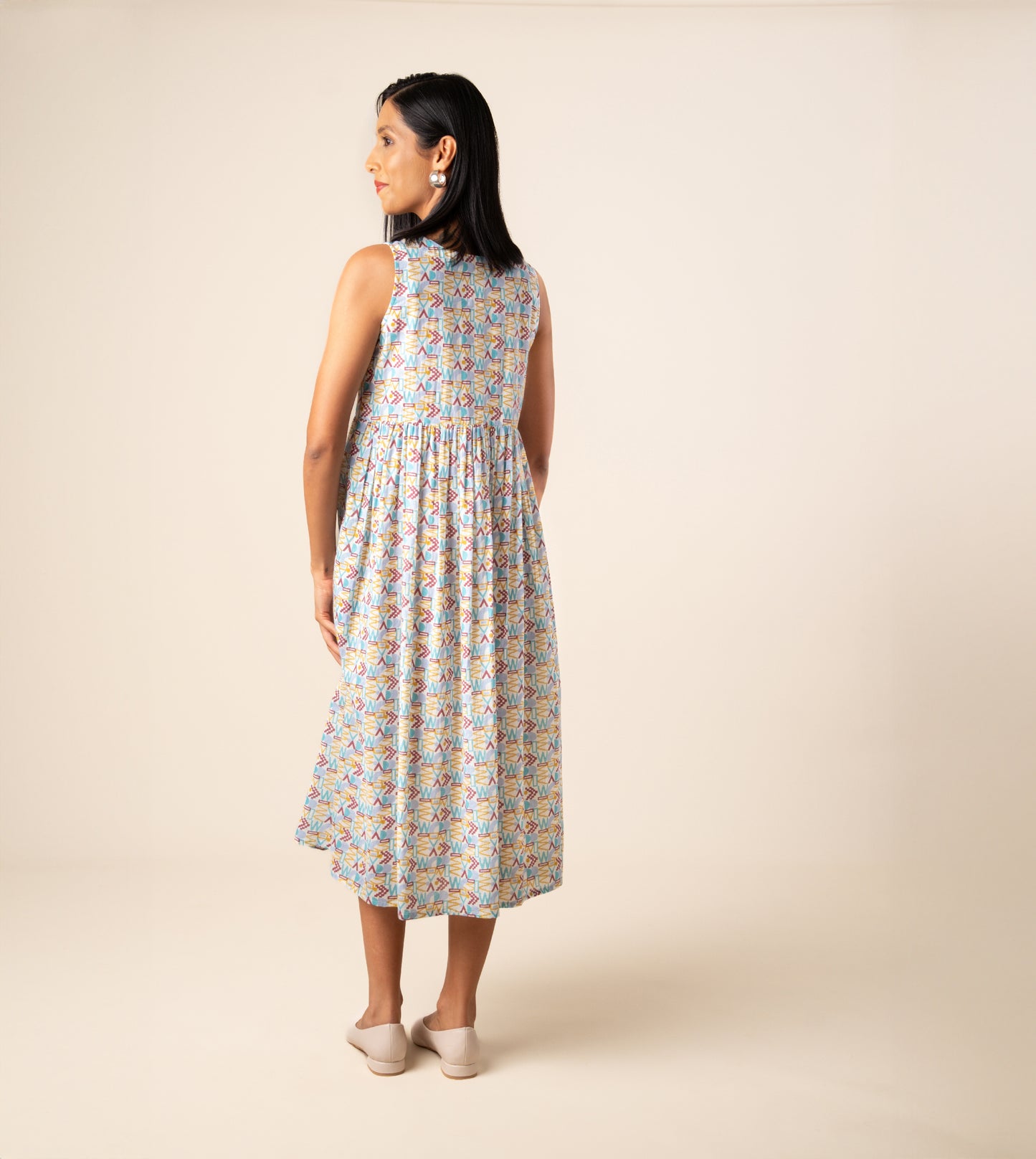 Suki Dress Girard | Harkoi Studio - Turn heads with the Suki Dress in the bold Girard pattern. Keywords: sustainable dress, eco-friendly fashion, Suki Dress, Girard-patterned dress, ethical clothing.
