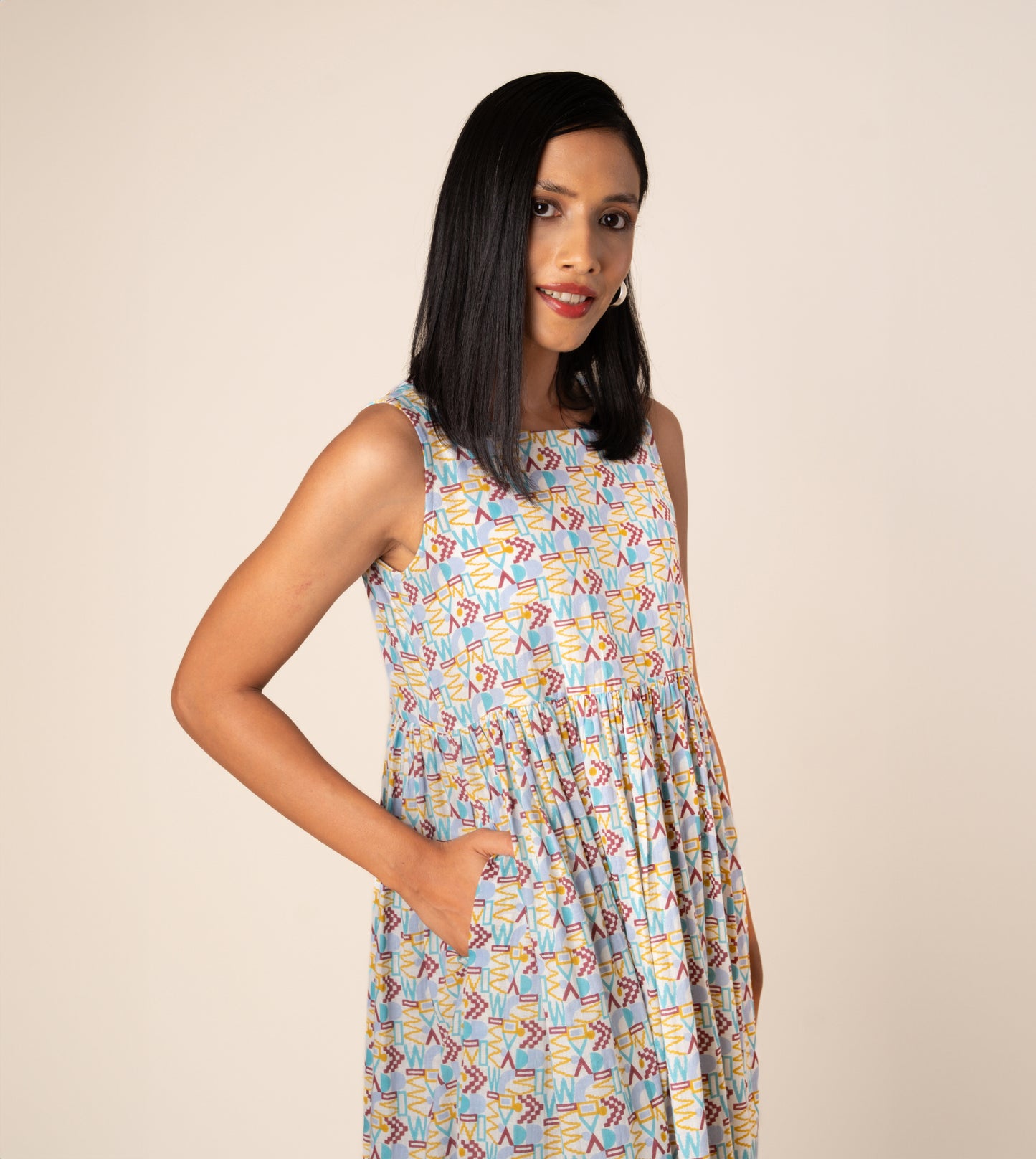Suki Dress Girard | Harkoi Studio - Turn heads with the Suki Dress in the bold Girard pattern. Keywords: sustainable dress, eco-friendly fashion, Suki Dress, Girard-patterned dress, ethical clothing.