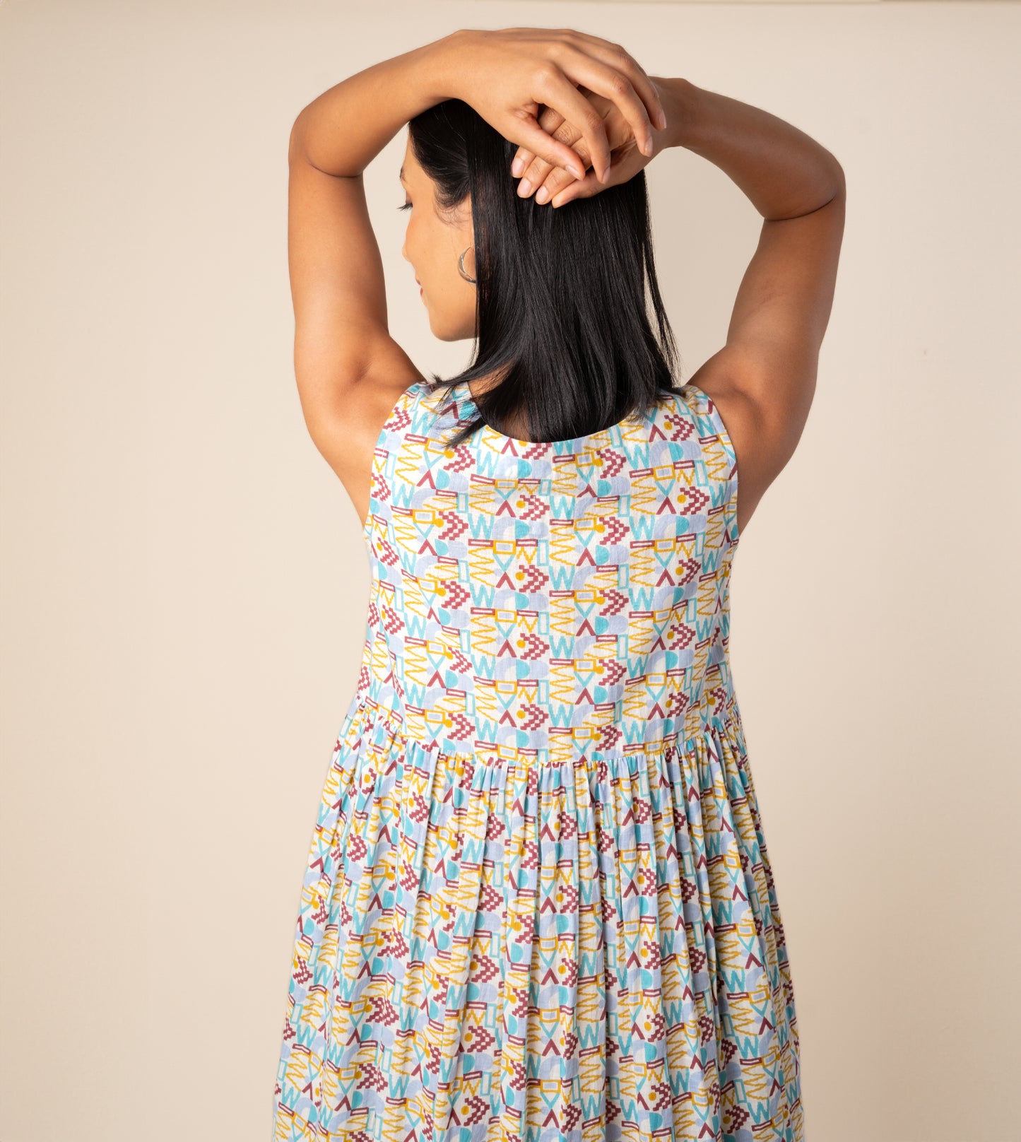 Suki Dress Girard | Harkoi Studio - Turn heads with the Suki Dress in the bold Girard pattern. Keywords: sustainable dress, eco-friendly fashion, Suki Dress, Girard-patterned dress, ethical clothing.