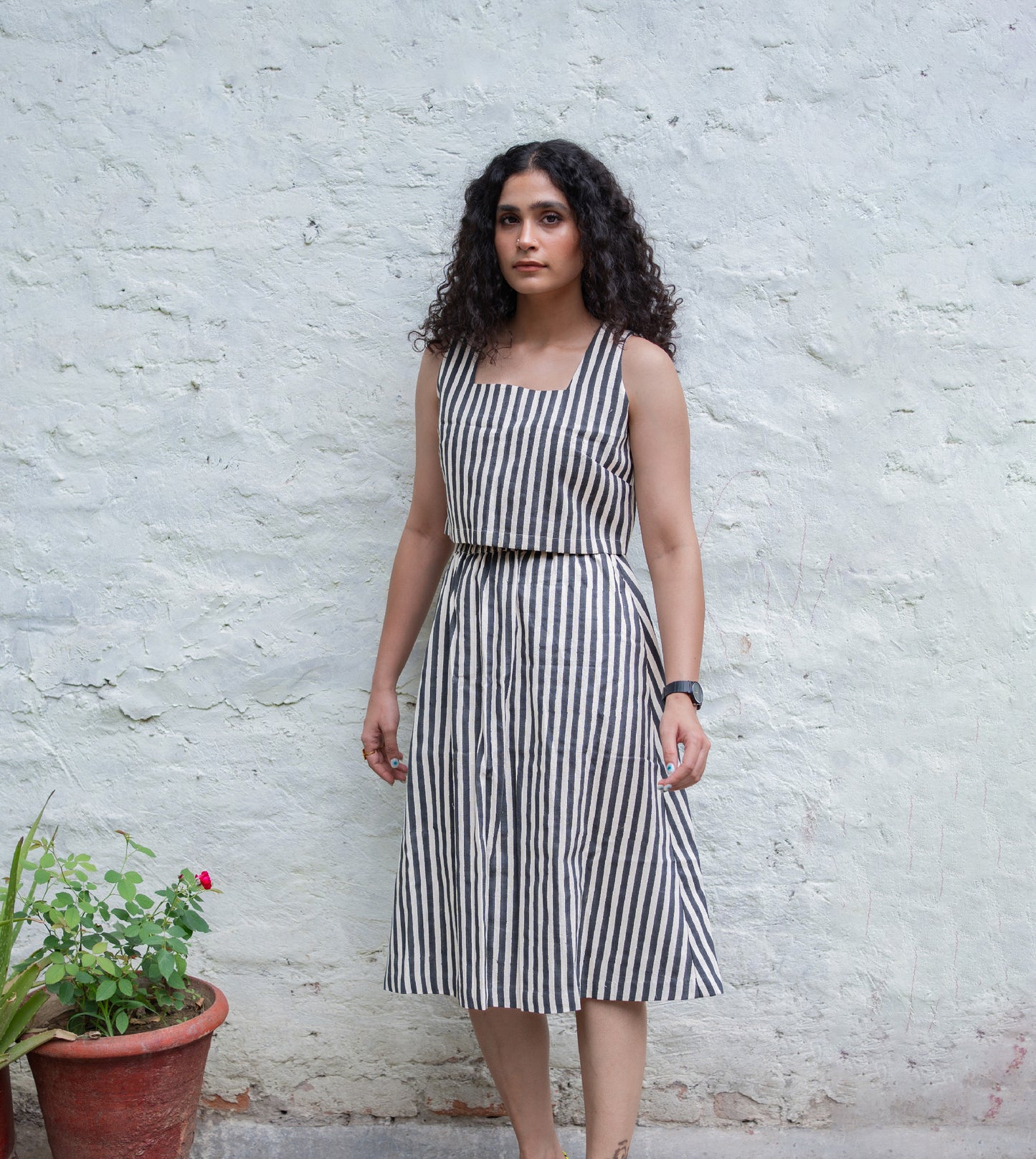 Stripes Yoko Skirt in Black ? a paneled, long sustainable cotton skirt with an elastic waistband and pockets. Made from organic, hand-loomed 'kala' cotton in India.