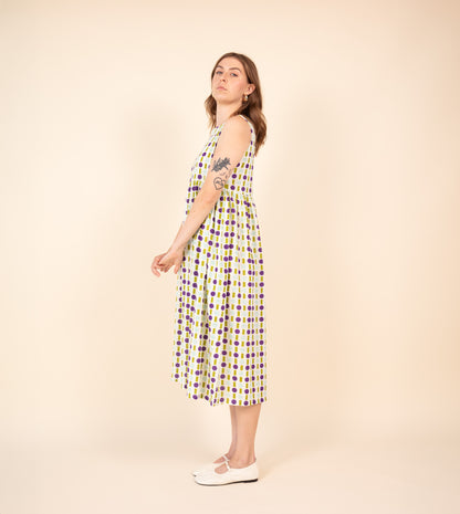 Stop-Gap Suki Dress - Green Purple - Harkoi - Make a statement with the Stop-Gap Suki Dress in green & purple. Keywords: sustainable dress, eco-friendly fashion, Stop-Gap Suki Dress, green and purple dress, ethical clothing.