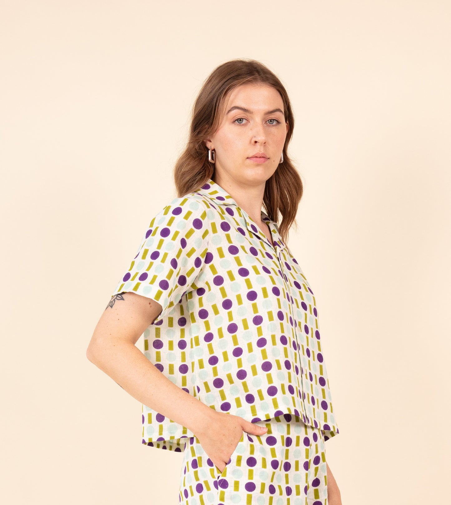 Stop Gap Rin Top Purple Green | Harkoi Studio - A handcrafted masterpiece infused with culture and creativity. Keywords: stop, gap, rin, top, purple, green, sustainable green, eco-friendly fashion, rin top purple.