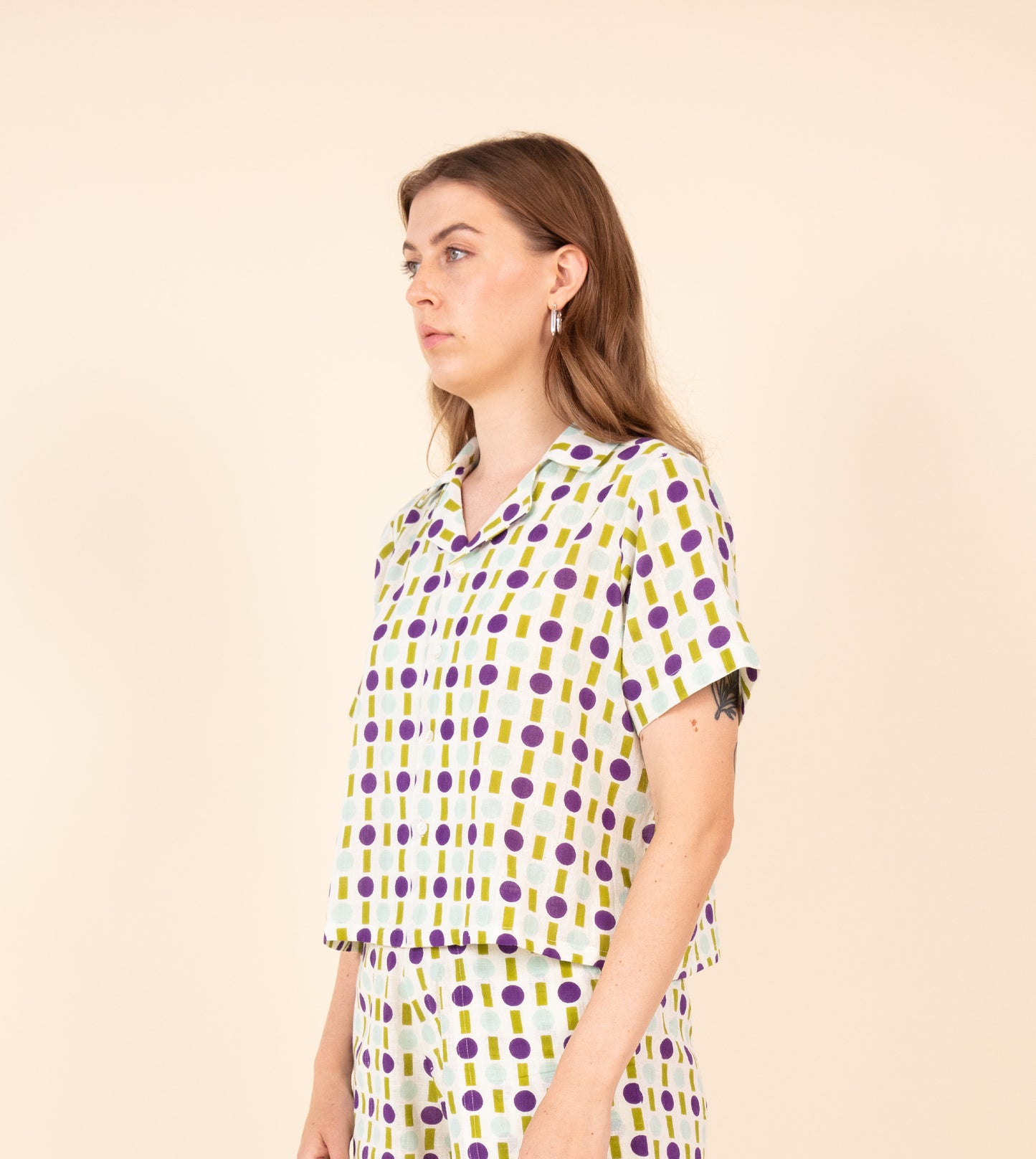 Stop Gap Rin Top Purple Green | Harkoi Studio - A handcrafted masterpiece infused with culture and creativity. Keywords: stop, gap, rin, top, purple, green, sustainable green, eco-friendly fashion, rin top purple.