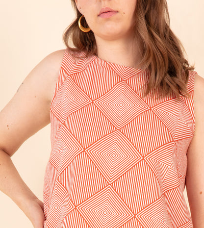 Radiate Akira Top Orange | Harkoi Studio - Elevating traditional patterns with a modern edge, the Radiate Akira, a sustainable- with precision and care. Keywords: radiate, akira, top, orange, sustainable orange, eco-friendly fashion, top.